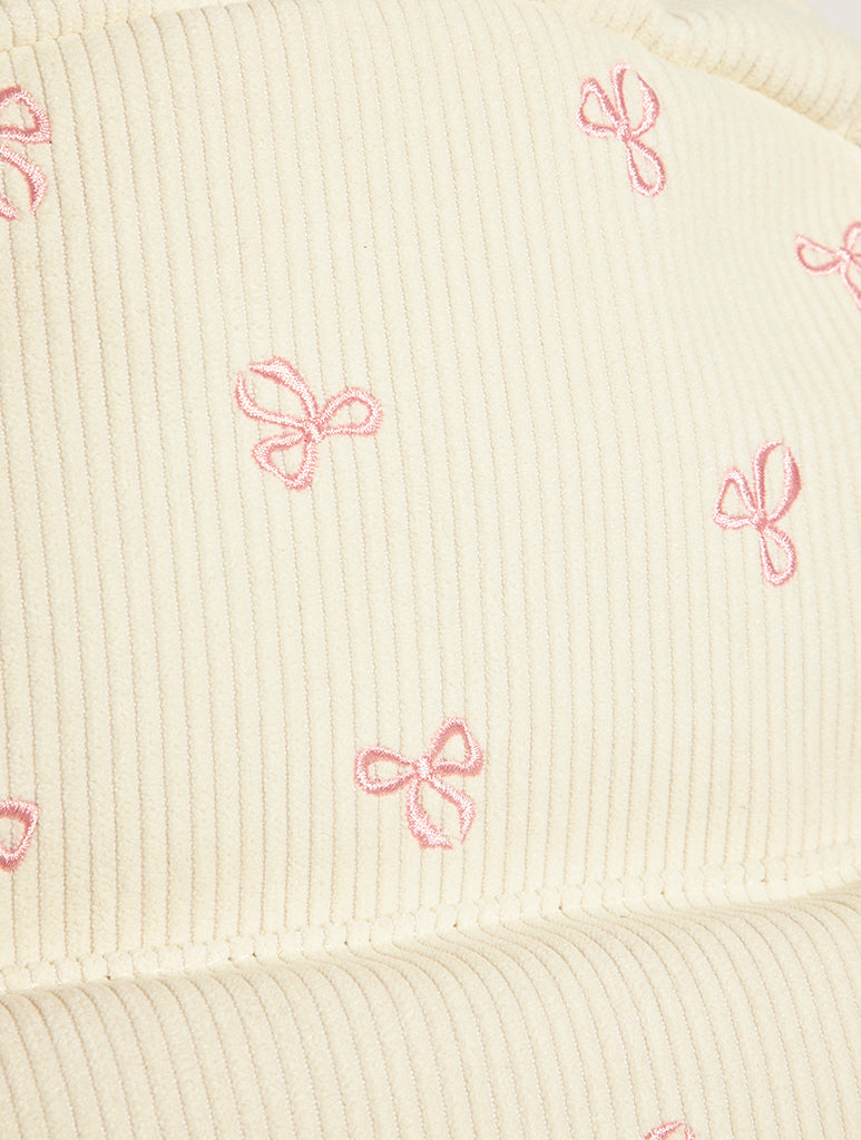 Custard Bow Embroidered Backpack in Cream