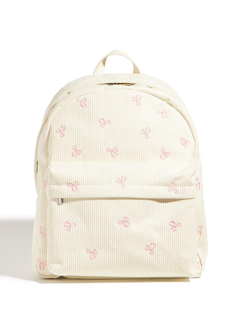 Custard Bow Embroidered Backpack in Cream