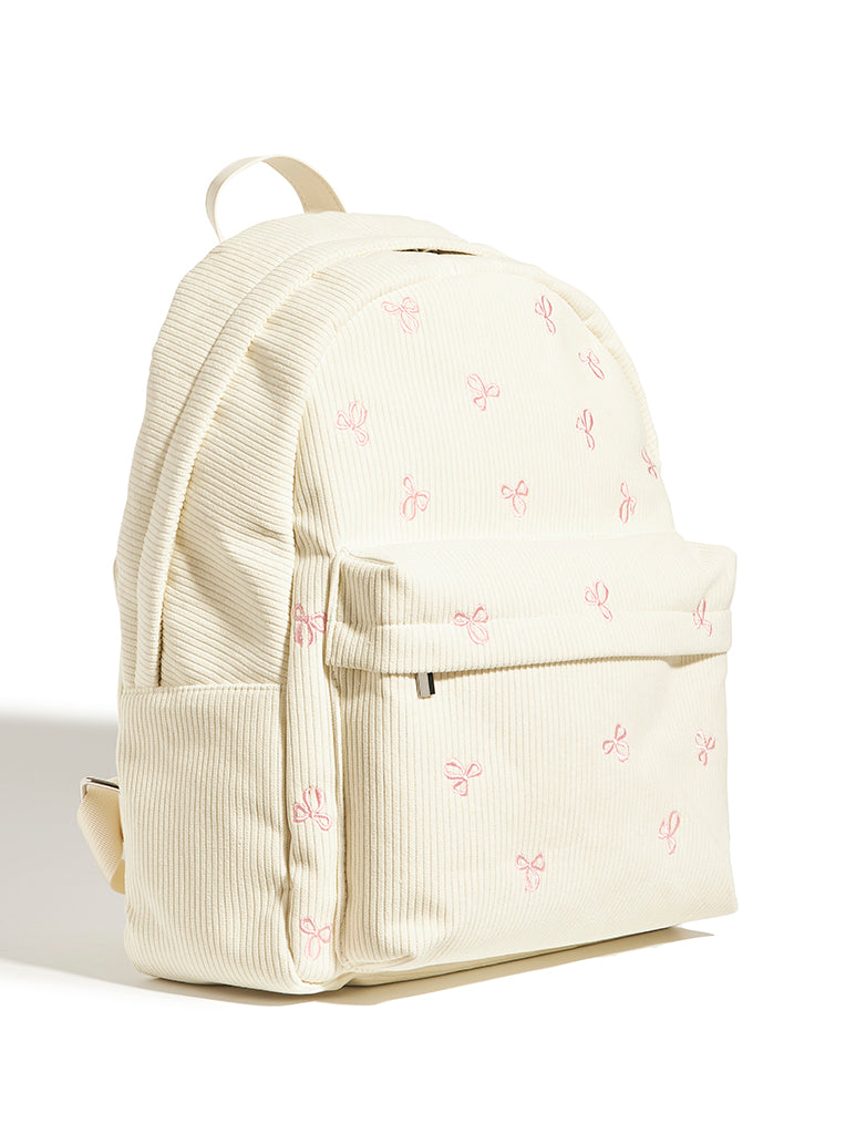 Custard Bow Embroidered Backpack in Cream